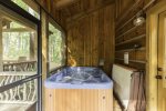 4 person hot tub on screened in porch